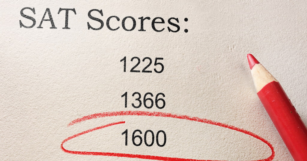 Red circle and pencil with SAT scores- 1225, 1366 and 1600