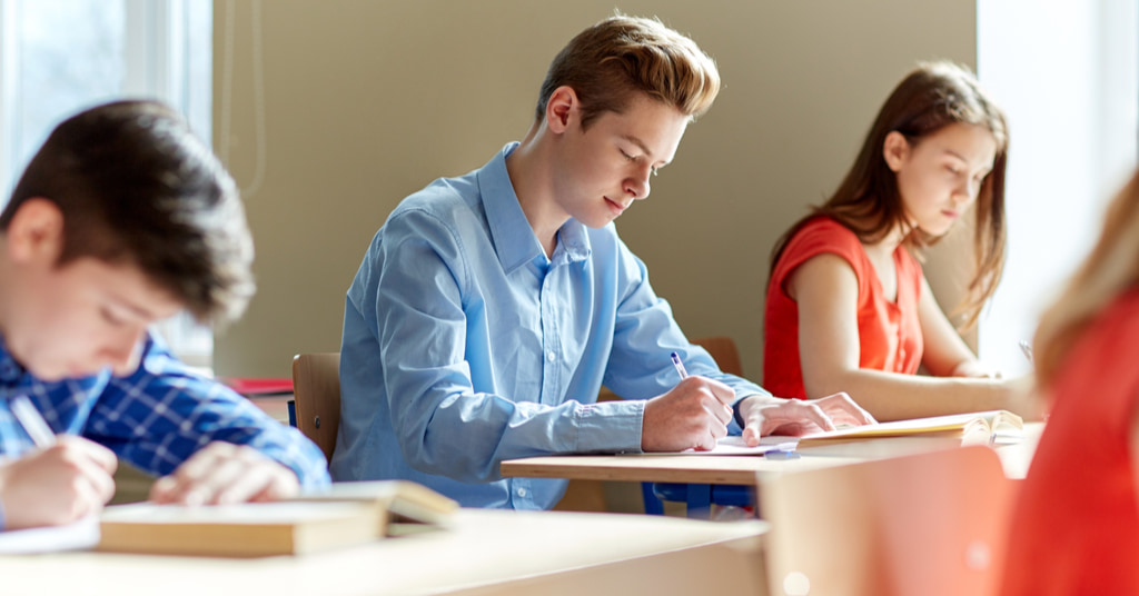 Group of students reading about the most popular ap exam courses