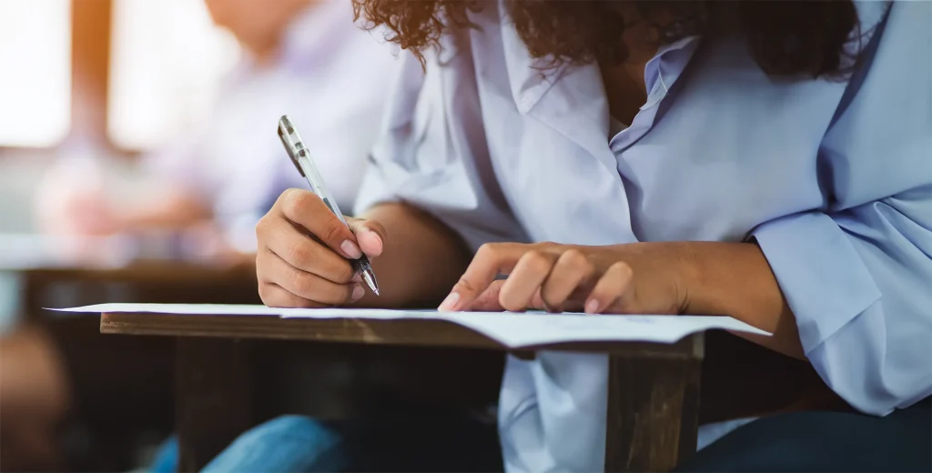 Student taking AP English Language Free-Response Exam Section