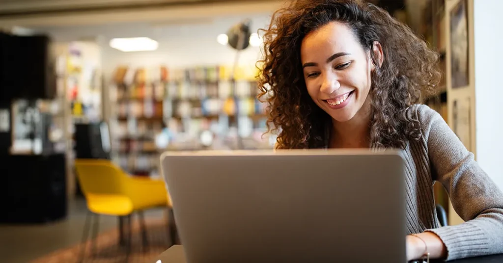 Image of a student studying on a laptop, symbolizing focused ACT prep during the summer with digital tools and self-paced learning.