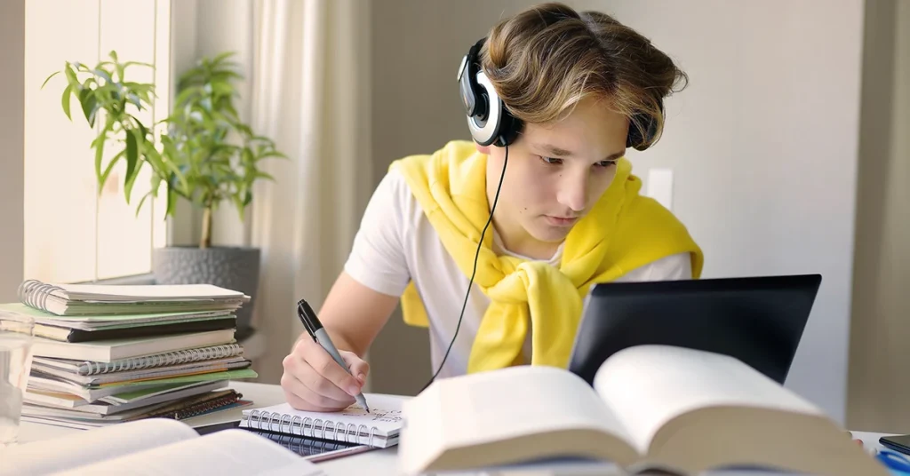 High school student preparing for ACT exam in the laptop