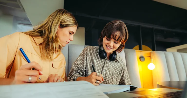 2 high school girls practicing UWorld practice questions